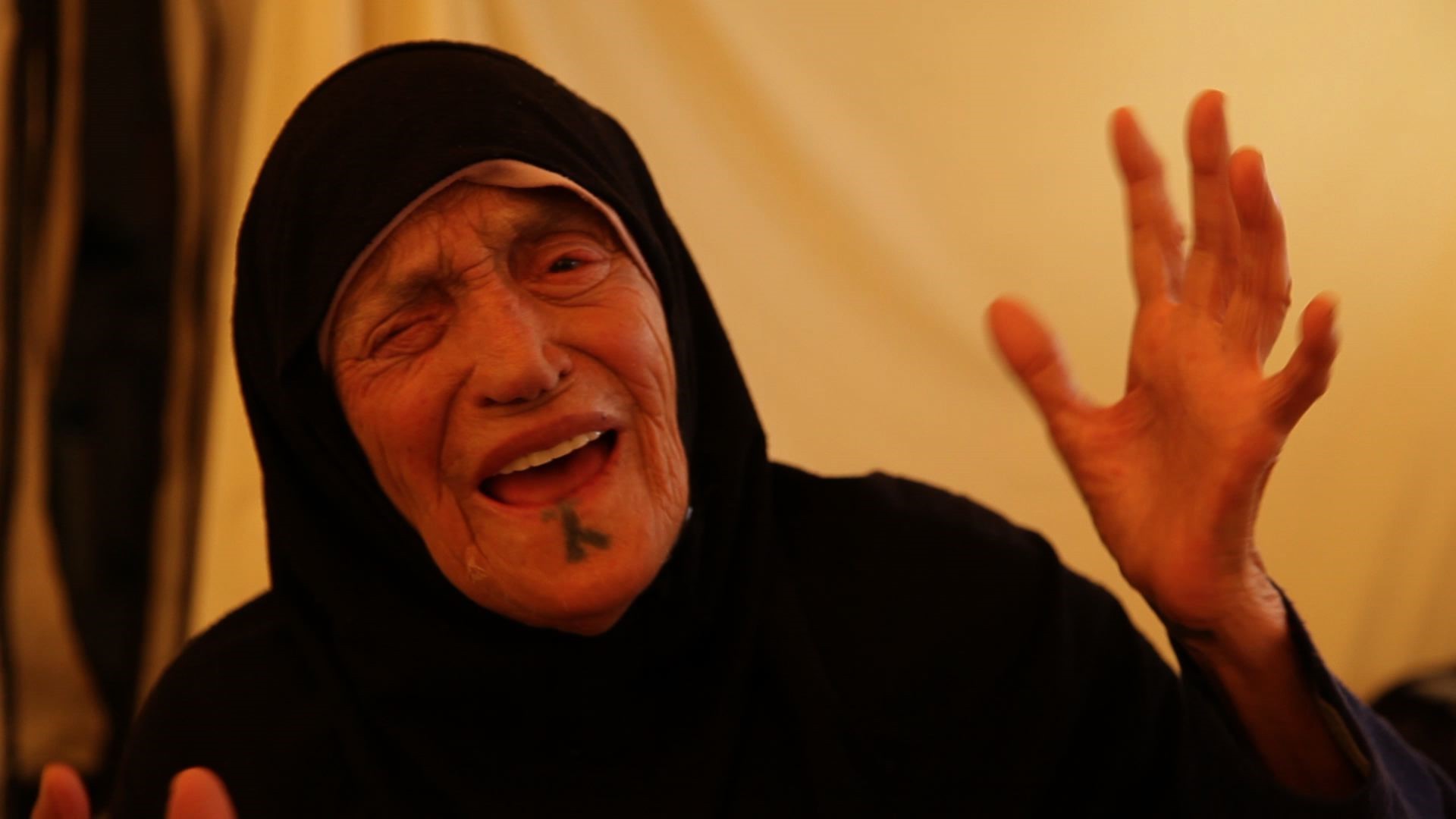 an elderly lady in syria